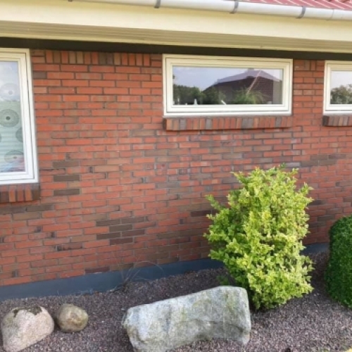 Facaderenovering med omfugning af murværk ved hus i Varde