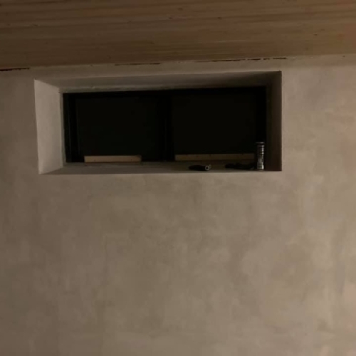 Ny pudset kældervæg udført af murer i Esbjerg