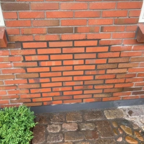Reparation og udskiftning af mursten på facade i Esbjerg