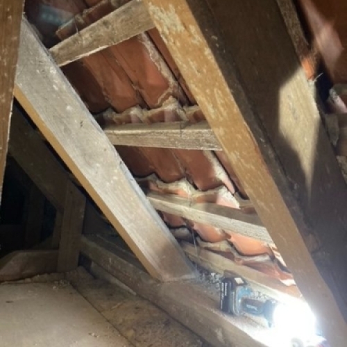 Tagrenovering med understrygning udført af murer i Esbjerg